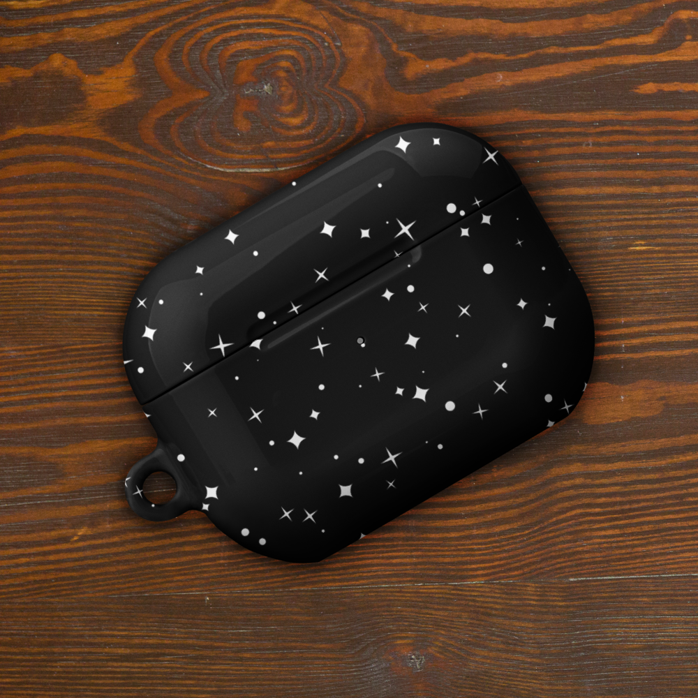 A black AirPods case featuring white little starts on it as you can see on the sky at night.